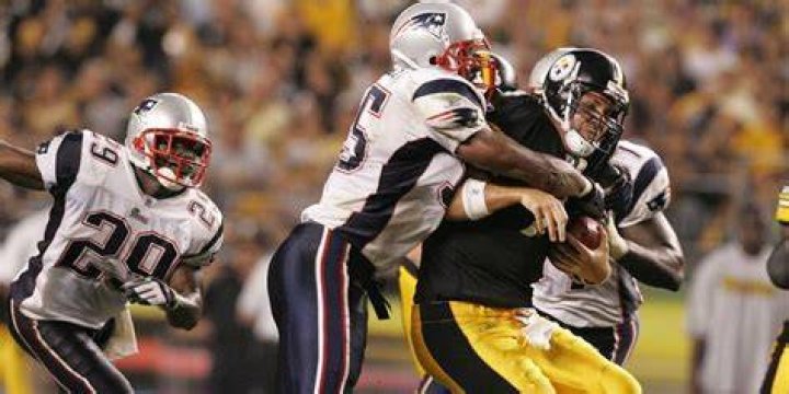Willie McGinest tackling Ben Roethlisberger.